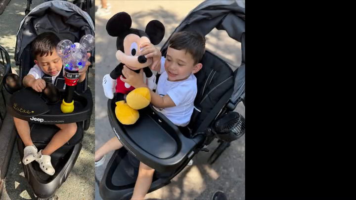 Katelyn with her family and a Jeep stroller in a family UGC video