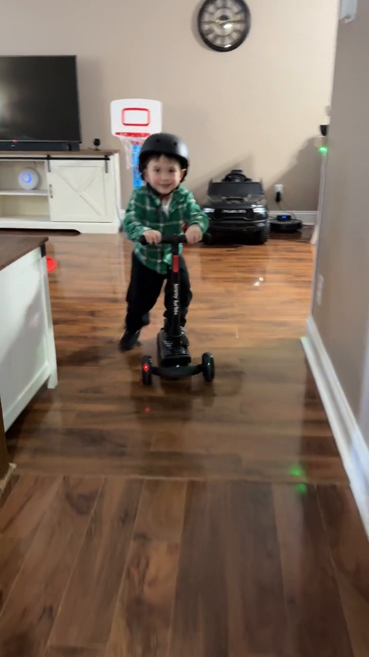 Katelyn and her family riding scooters in a family UGC video