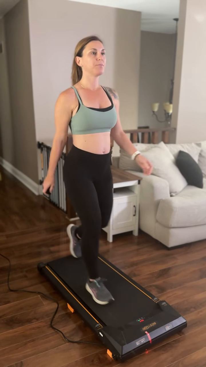 Katelyn walking on a walking pad in a fitness UGC video